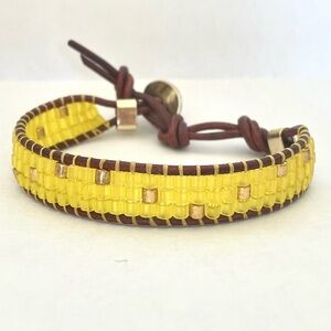 Handmade leather and bead friendship bracelet. Gently loved.